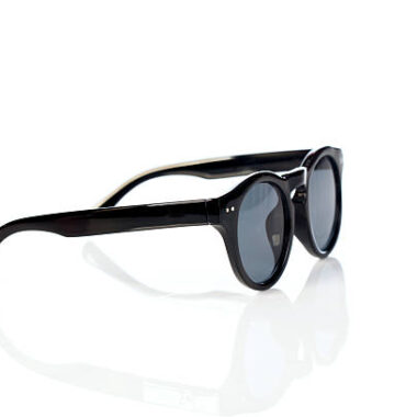 Sunglasses on white background ,selective focus